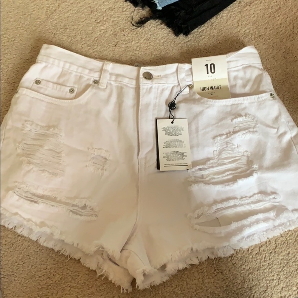 Size 10 white high waisted ripped shorts